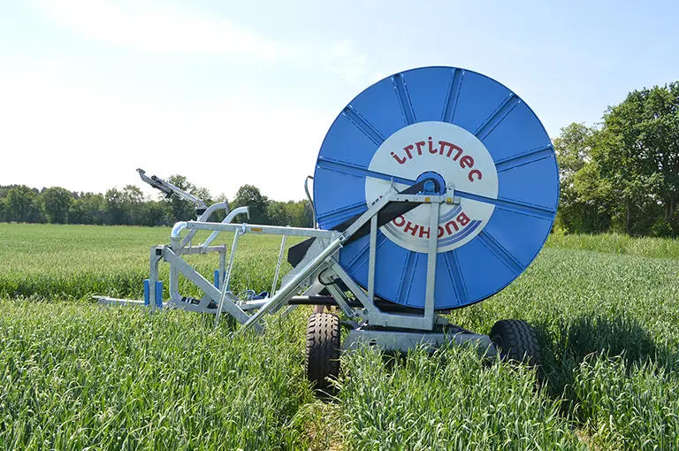 Hose reel in a cereal field